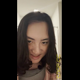 Emi smiles for the camera, then stands in the shower in a pink hoodie and jiggles her poop out, smearing it all over her bare ass. Vertical format video. Over 6 minutes.
